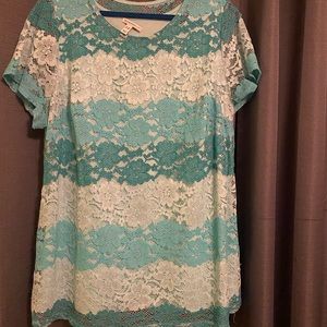 Nice heavy lace top with shell  33 long